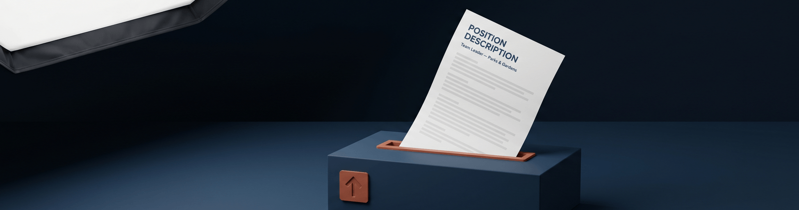 Brand artwork: a crisp white Position Description sheet dropping into a terracotta-lipped slot on a navy box marked with an upload arrow - upload your PD